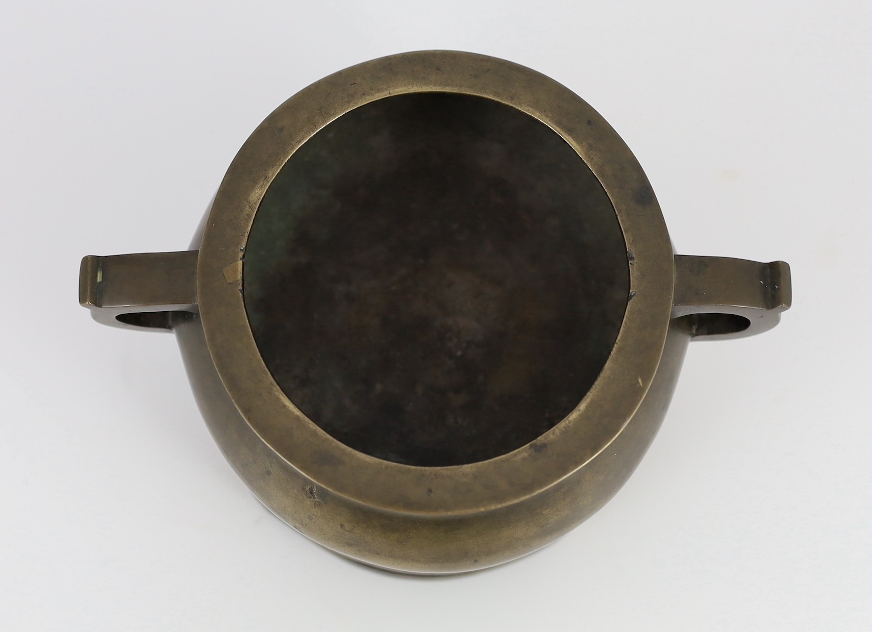 A Chinese bronze censer and stand, ding, 18th/19th century, 18.7cm wide, 11cm high